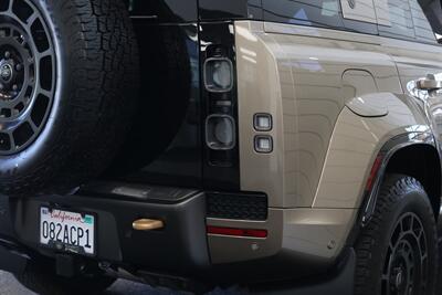 2025 Land Rover Defender 110 P635 OCTA  1-CALIFORNIA OWNER* FRIDGE* POWER FOLD RUNNING BOARDS* EXTERIOR PROTECTION PKG* 20 "DIAMOND TURNED SATIN DARK WHEEL PKG* BURN SIENNA INTERIOR* ALL BOOKS-2 KEYS-WINDOW STICKER* CERAMIC TINT* - Photo 14 - Portland, OR 97230