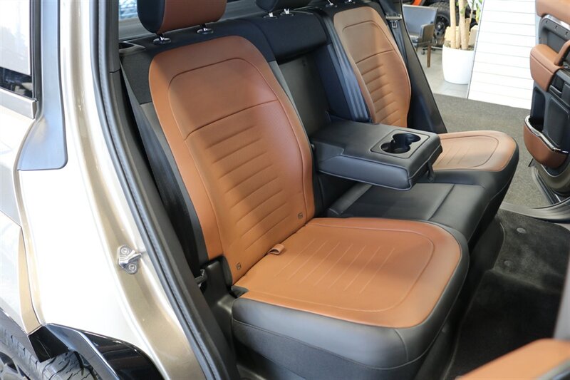 2025 Land Rover Defender 110 P635 OCTA  1-CALIFORNIA OWNER* FRIDGE* POWER FOLD RUNNING BOARDS* EXTERIOR PROTECTION PKG* 20 "DIAMOND TURNED SATIN DARK WHEEL PKG* BURN SIENNA INTERIOR* ALL BOOKS-2 KEYS-WINDOW STICKER* CERAMIC TINT* - Photo 21 - Portland, OR 97230