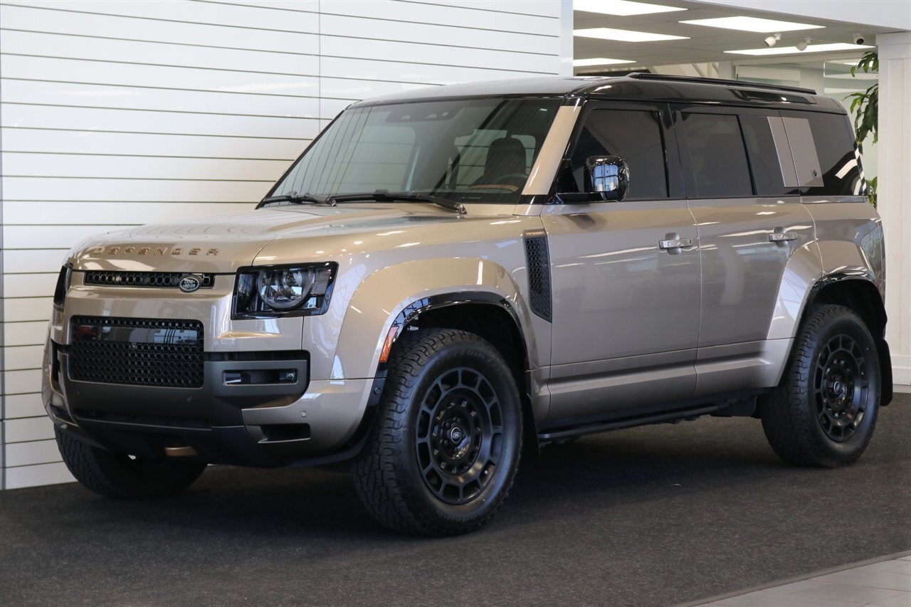 2025 Land Rover Defender 110 P635 OCTA  1-CALIFORNIA OWNER* FRIDGE* POWER FOLD RUNNING BOARDS* EXTERIOR PROTECTION PKG* 20 "DIAMOND TURNED SATIN DARK WHEEL PKG* BURN SIENNA INTERIOR* ALL BOOKS-2 KEYS-WINDOW STICKER* CERAMIC TINT* - Photo 1 - Portland, OR 97230