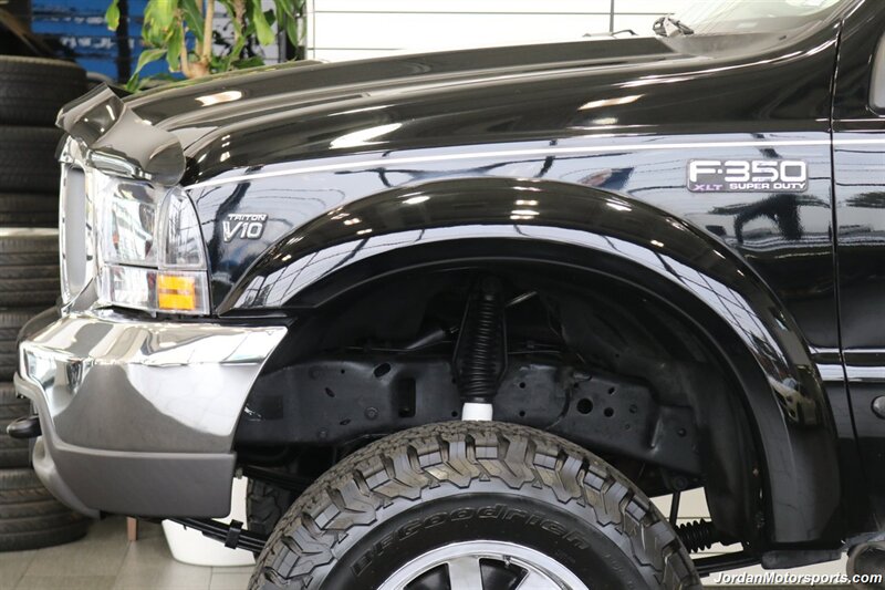 1999 Ford F-350 XLT  1-OWNER* 100% RUST FREE* TRITON V-10* 4 "PRO COMP LIFT W/DUAL STEERING STABILIZERS* 35 "BFG KO2s* CANOPY* PAINT MATCHED FLARES* FULL FRESH SERVICE - Photo 53 - Portland, OR 97230