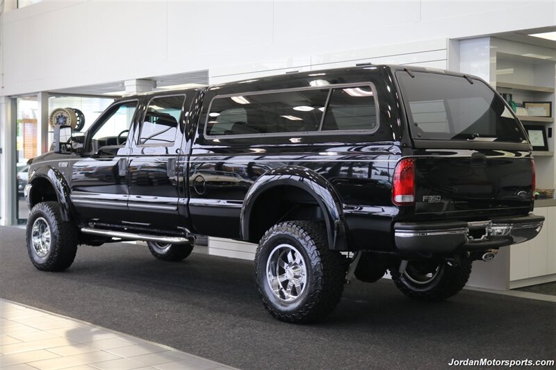 1999 Ford F-350 XLT  1-OWNER* 100% RUST FREE* TRITON V-10* 4 "PRO COMP LIFT W/DUAL STEERING STABILIZERS* 35 "BFG KO2s* CANOPY* PAINT MATCHED FLARES* FULL FRESH SERVICE - Photo 6 - Portland, OR 97230