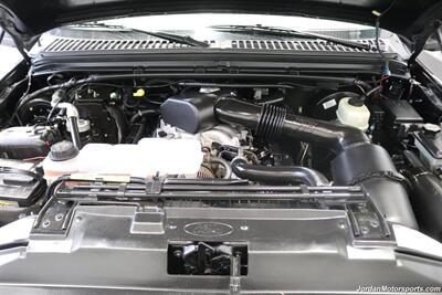 1999 Ford F-350 XLT  1-OWNER* 100% RUST FREE* TRITON V-10* 4 "PRO COMP LIFT W/DUAL STEERING STABILIZERS* 35 "BFG KO2s* CANOPY* PAINT MATCHED FLARES* FULL FRESH SERVICE - Photo 16 - Portland, OR 97230