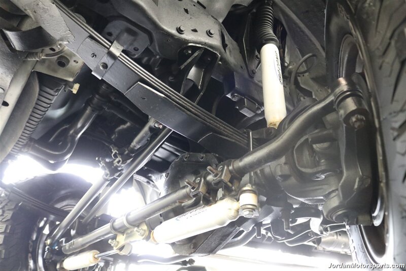 1999 Ford F-350 XLT  1-OWNER* 100% RUST FREE* TRITON V-10* 4 "PRO COMP LIFT W/DUAL STEERING STABILIZERS* 35 "BFG KO2s* CANOPY* PAINT MATCHED FLARES* FULL FRESH SERVICE - Photo 34 - Portland, OR 97230