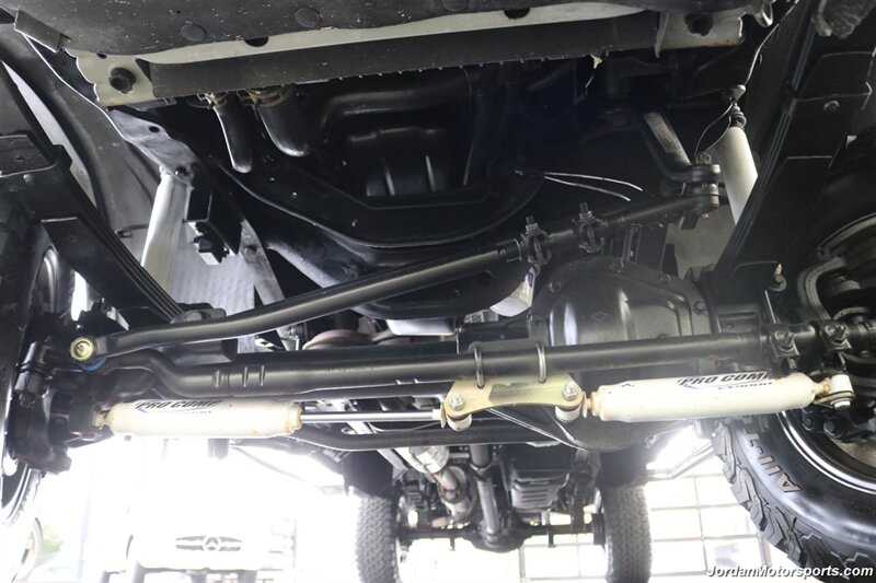 1999 Ford F-350 XLT  1-OWNER* 100% RUST FREE* TRITON V-10* 4 "PRO COMP LIFT W/DUAL STEERING STABILIZERS* 35 "BFG KO2s* CANOPY* PAINT MATCHED FLARES* FULL FRESH SERVICE - Photo 80 - Portland, OR 97230