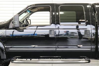 1999 Ford F-350 XLT  1-OWNER* 100% RUST FREE* TRITON V-10* 4 "PRO COMP LIFT W/DUAL STEERING STABILIZERS* 35 "BFG KO2s* CANOPY* PAINT MATCHED FLARES* FULL FRESH SERVICE - Photo 18 - Portland, OR 97230