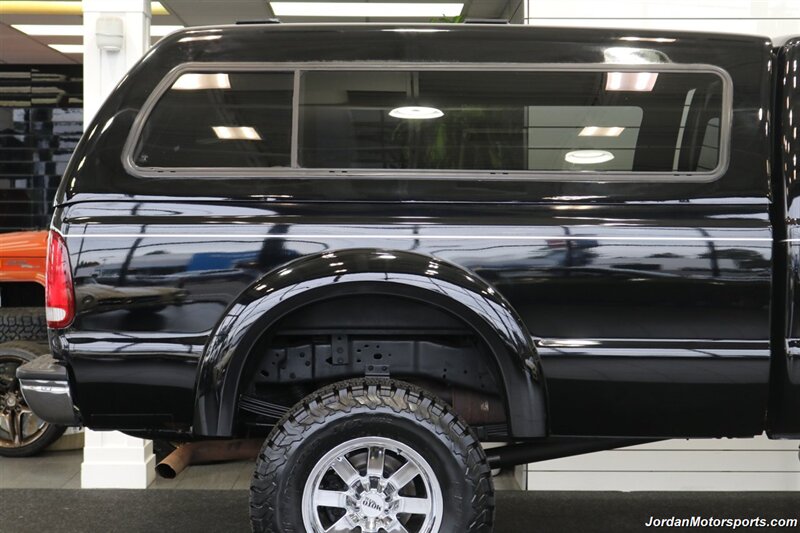 1999 Ford F-350 XLT  1-OWNER* 100% RUST FREE* TRITON V-10* 4 "PRO COMP LIFT W/DUAL STEERING STABILIZERS* 35 "BFG KO2s* CANOPY* PAINT MATCHED FLARES* FULL FRESH SERVICE - Photo 58 - Portland, OR 97230