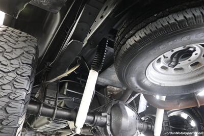 1999 Ford F-350 XLT  1-OWNER* 100% RUST FREE* TRITON V-10* 4 "PRO COMP LIFT W/DUAL STEERING STABILIZERS* 35 "BFG KO2s* CANOPY* PAINT MATCHED FLARES* FULL FRESH SERVICE - Photo 27 - Portland, OR 97230