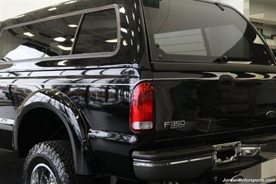 1999 Ford F-350 XLT  1-OWNER* 100% RUST FREE* TRITON V-10* 4 "PRO COMP LIFT W/DUAL STEERING STABILIZERS* 35 "BFG KO2s* CANOPY* PAINT MATCHED FLARES* FULL FRESH SERVICE - Photo 40 - Portland, OR 97230