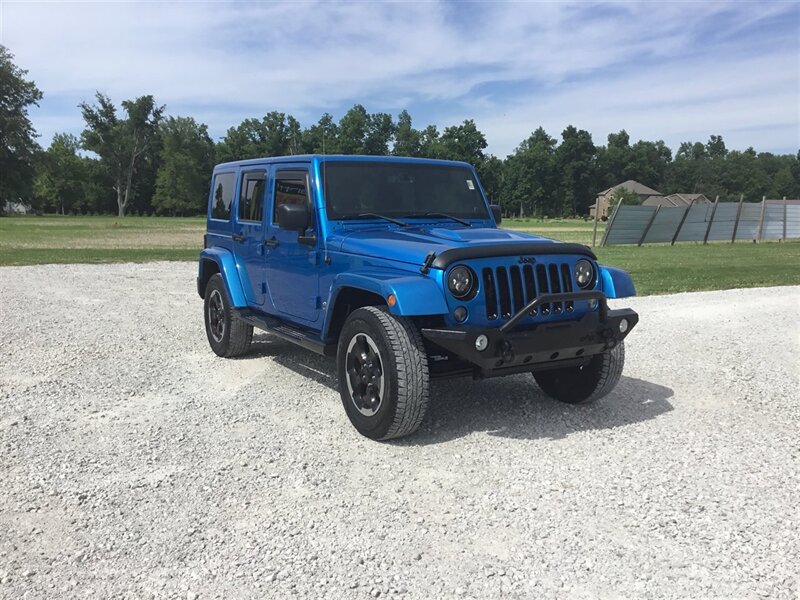 2014 Jeep Wrangler Unlimited Polar Edition   - Photo 1 - Terre Haute, IN 47802