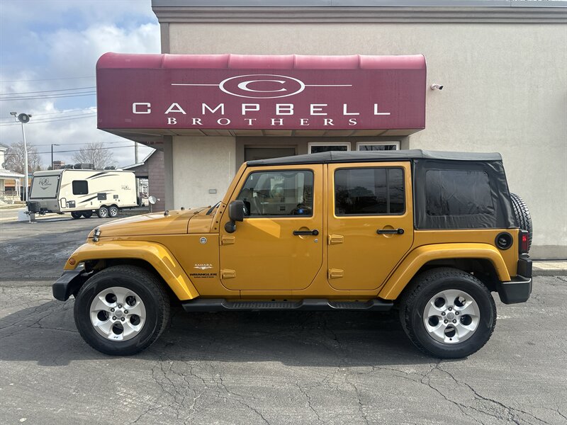 2014 Jeep Wrangler Unlimited Sahara   - Photo 1 - Rushville, IN 46173