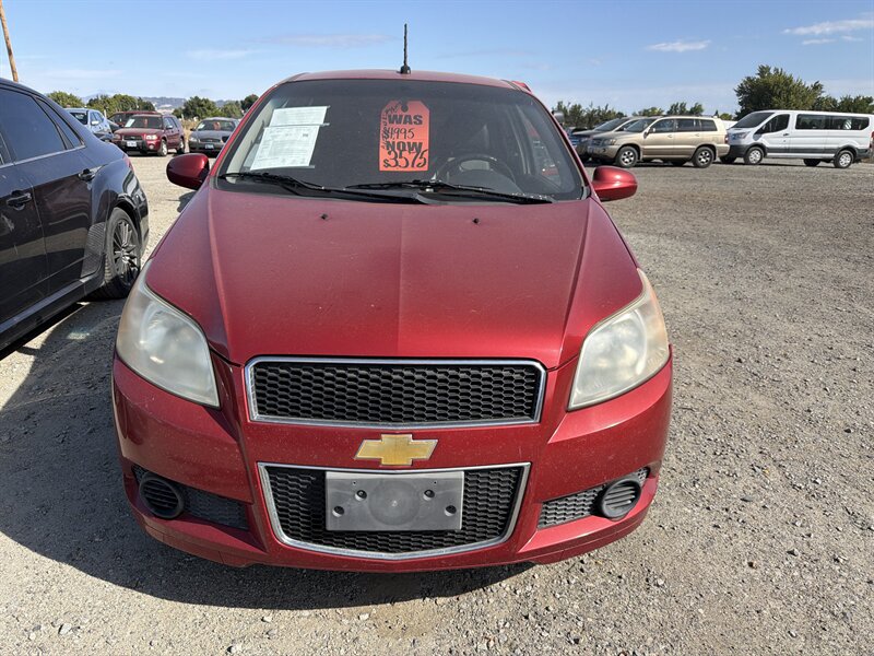 Sport Red 2009 Chevrolet Aveo Hatchback Front-Wheel Drive 5-Speed Manual