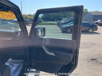 2015 Jeep Wrangler Unlimited Sahara 4WD   - Photo 13 - Clio, MI 48420