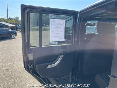 2015 Jeep Wrangler Unlimited Sahara   - Photo 8 - Clio, MI 48420
