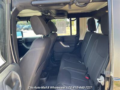 2015 Jeep Wrangler Unlimited Sahara   - Photo 9 - Clio, MI 48420