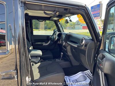2015 Jeep Wrangler Unlimited Sahara   - Photo 14 - Clio, MI 48420