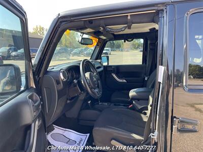2015 Jeep Wrangler Unlimited Sahara   - Photo 6 - Clio, MI 48420