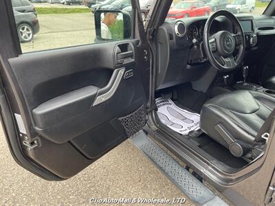 2016 Jeep Wrangler Unlimited Sahara   - Photo 5 - Clio, MI 48420