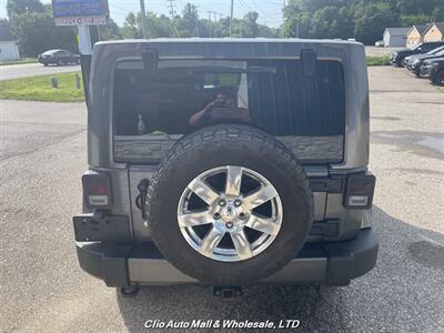 2016 Jeep Wrangler Unlimited Sahara   - Photo 4 - Clio, MI 48420