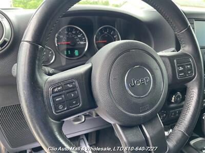 2016 Jeep Wrangler Unlimited Sahara 4WD  Spotless Frame!! - Photo 14 - Clio, MI 48420