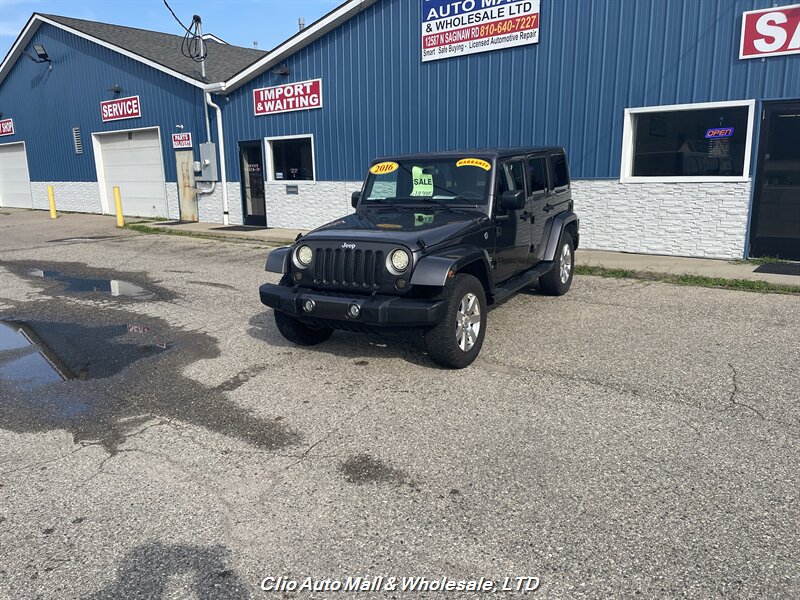 2016 Jeep Wrangler Unlimited Sahara - Photo 1 - Clio, MI 48420