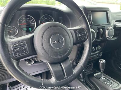 2016 Jeep Wrangler Unlimited Sahara   - Photo 8 - Clio, MI 48420