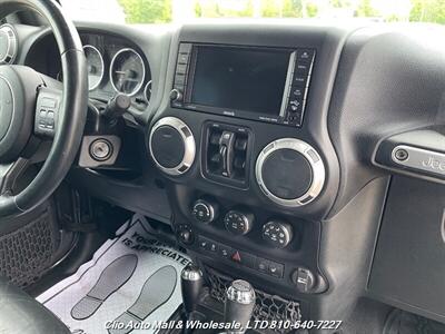 2016 Jeep Wrangler Unlimited Sahara 4WD  Spotless Frame!! - Photo 34 - Clio, MI 48420