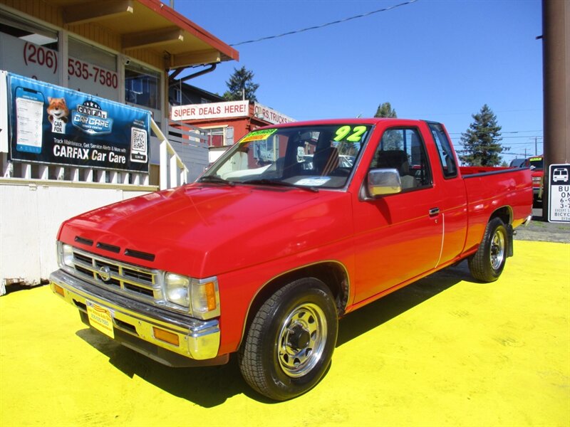Red 1992 Nissan Truck Pickup Truck Rear-Wheel Drive Automatic
