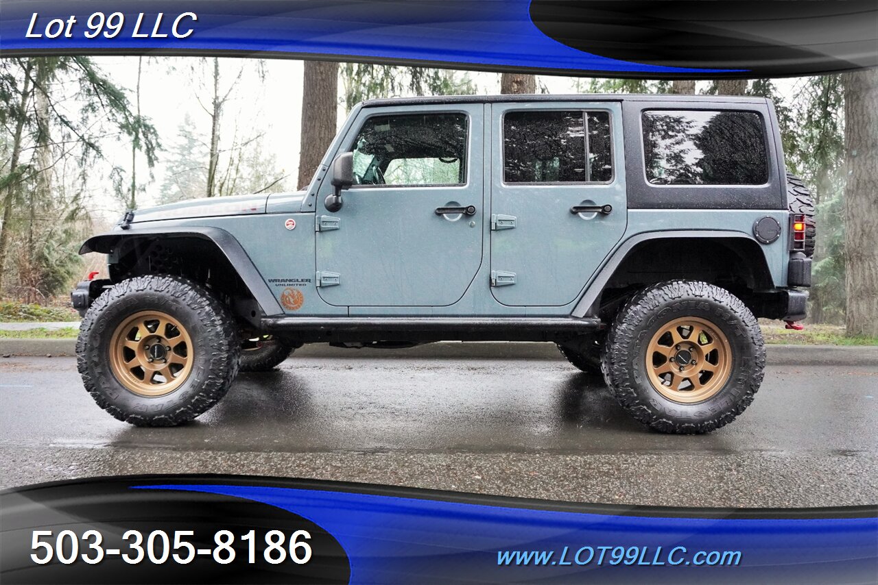 2015 Jeep Wrangler 4x4 Unlimited Rubicon HARD ROCK 79K V6 Auto Heated  Leather GPS LIFTED Gold Wheels Newer Tires 1 OWNER - Photo 1 - Milwaukie, OR 97267