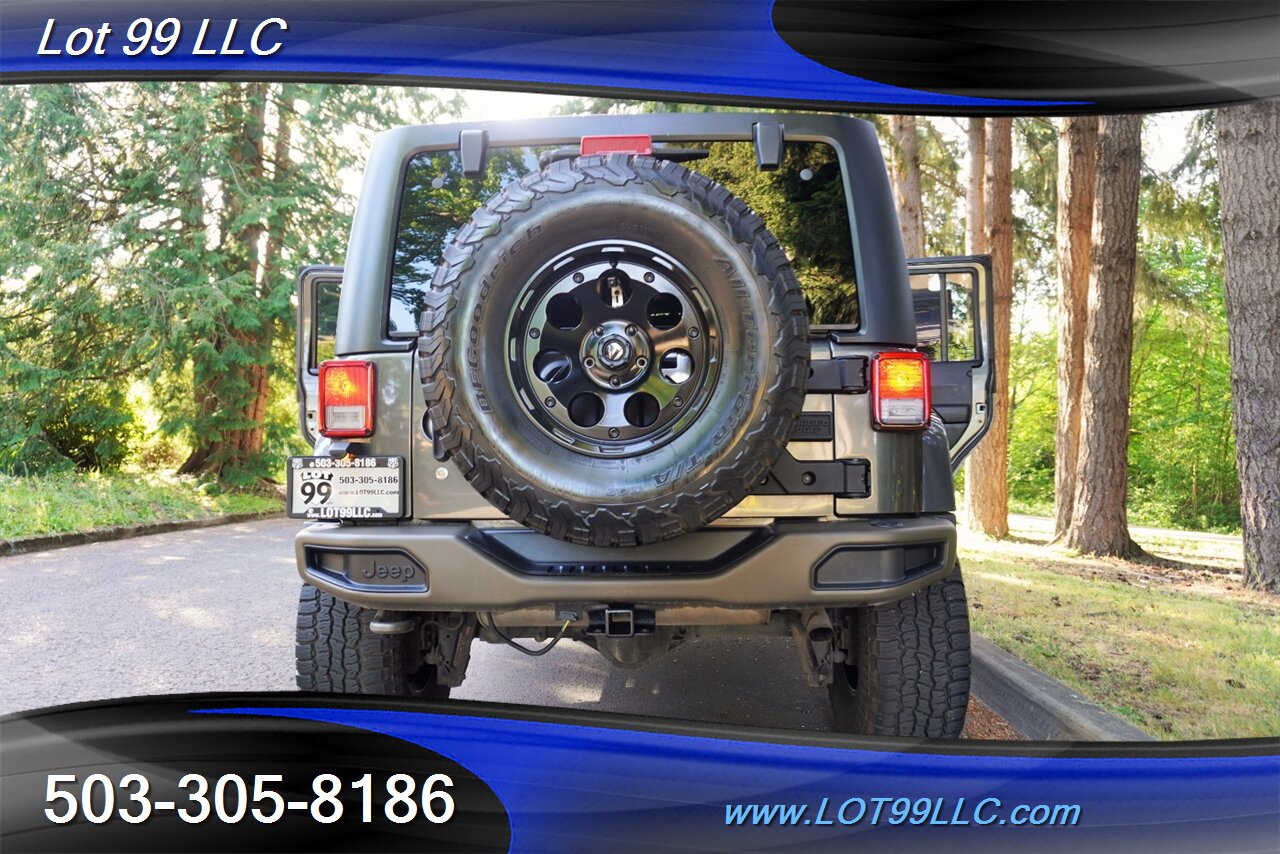 2016 Jeep Wrangler Unlimited Sahara 4X4 Unlimited 75th Anniversary Edition V6  6 Speed Manual BIG SCREEN LIFTED FUEL Wheels Newer Tires - Photo 30 - Milwaukie, OR 97267