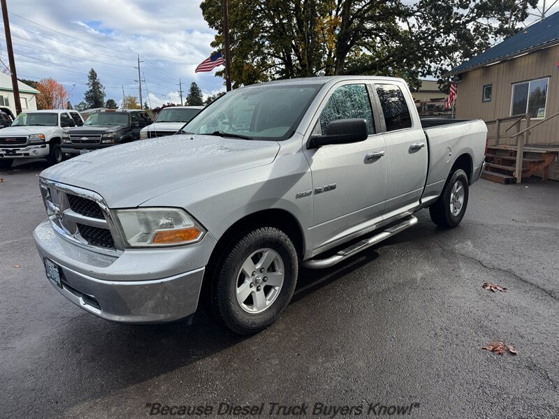 Silver 2010 Dodge RAM 1500 Pickup Truck Four-Wheel Drive Automatic