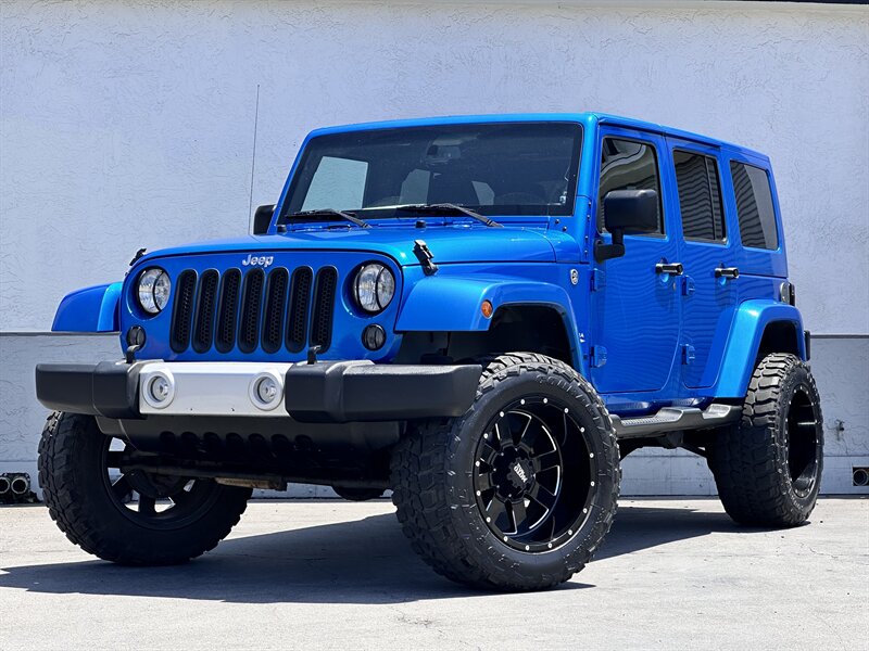2015 Jeep Wrangler Unlimited Sahara * LIFTED * 20 " RIMS * 35 " TIRES * 4X4 * - Photo 1 - Vista, CA 92084