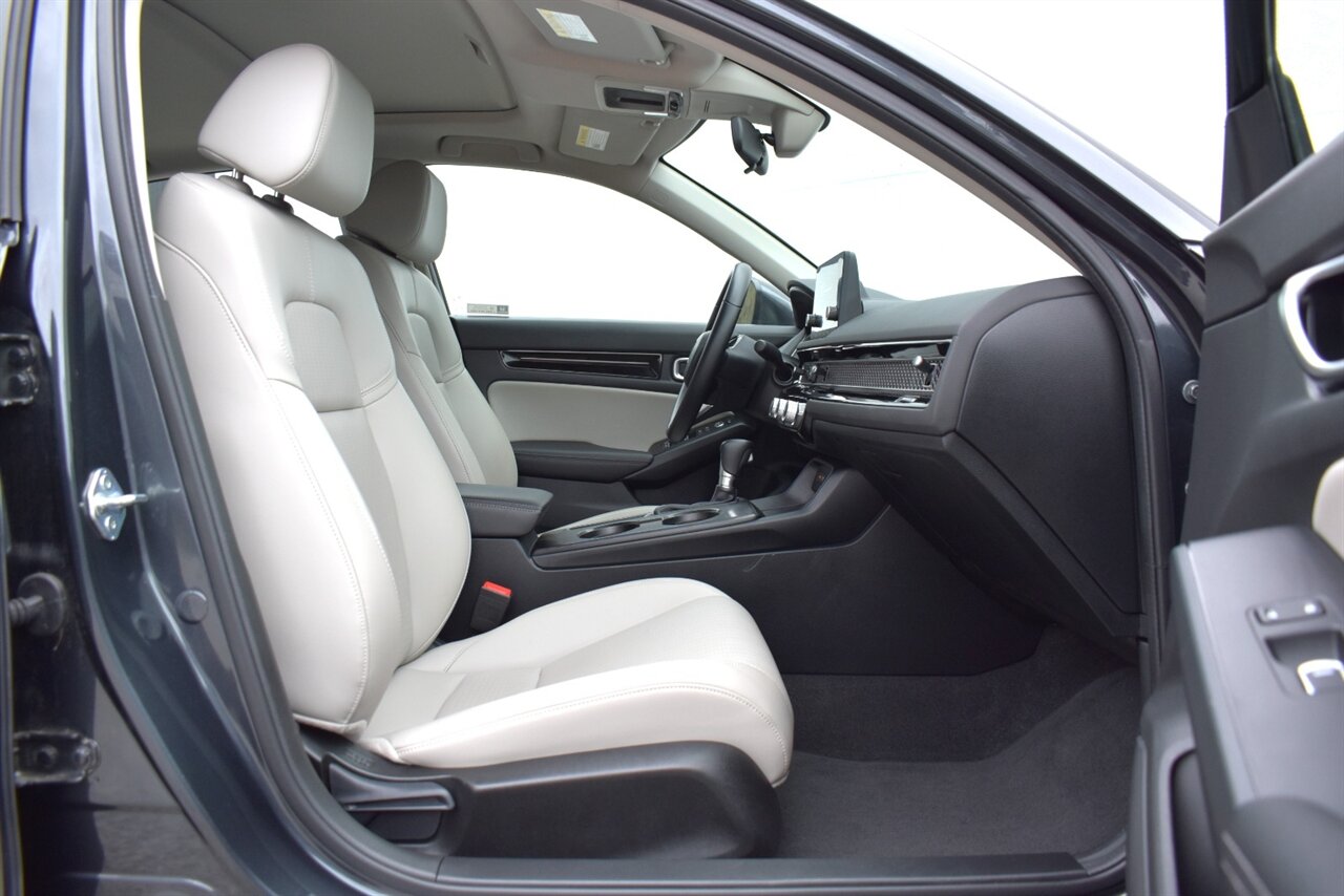 2024 Honda Civic EX-L Hatchback 4dr! Honda Sensing! Adaptive Cruise Control w/ Low-Speed Follow! Lane Keep Assist! Collision Mitigation Braking! Road Departure Mitigation! Backup Camera! Apple CarPlay! Android Auto! 18 " Alloy Wheels! - Photo 29 - Portland, OR 97266