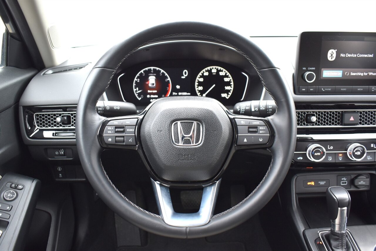 2024 Honda Civic EX-L Hatchback 4dr! Honda Sensing! Adaptive Cruise Control w/ Low-Speed Follow! Lane Keep Assist! Collision Mitigation Braking! Road Departure Mitigation! Backup Camera! Apple CarPlay! Android Auto! 18 " Alloy Wheels! - Photo 17 - Portland, OR 97266