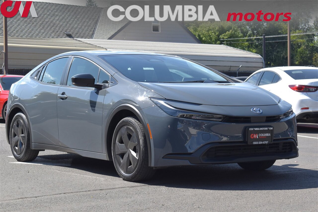 2024 Toyota Prius LE  4dr Hatchback! Toyota Safety Sense 3.0! Back Up Cam! Blind Spot Monitor! 57 City MPG! 56 Hwy MPG! Apple CarPlay! Android Auto! Trunk Cargo Cover! - Photo 1 - Portland, OR 97266