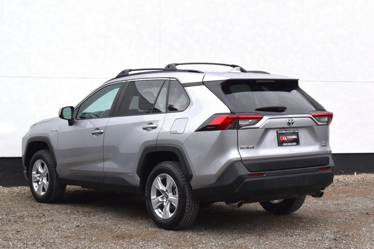 2019 Toyota RAV4 Hybrid LE AWD 4dr SUV! 41 City MPG! 38 Hwy MPG! Back Up Camera! Lane Assist! Blind Spot Monitor! Bluetooth Connectivity! Roof Rack! Heated Seats! Sport/ECO/EV/Trail Drive Modes! - Photo 2 - Portland, OR 97266