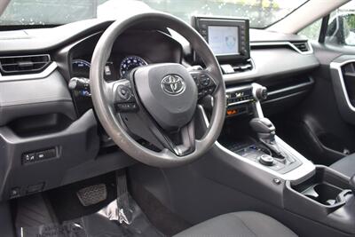 2019 Toyota RAV4 Hybrid LE AWD 4dr SUV! 41 City MPG! 38 Hwy MPG! Back Up Camera! Lane Assist! Blind Spot Monitor! Bluetooth Connectivity! Roof Rack! Heated Seats! Sport/ECO/EV/Trail Drive Modes! - Photo 3 - Portland, OR 97266