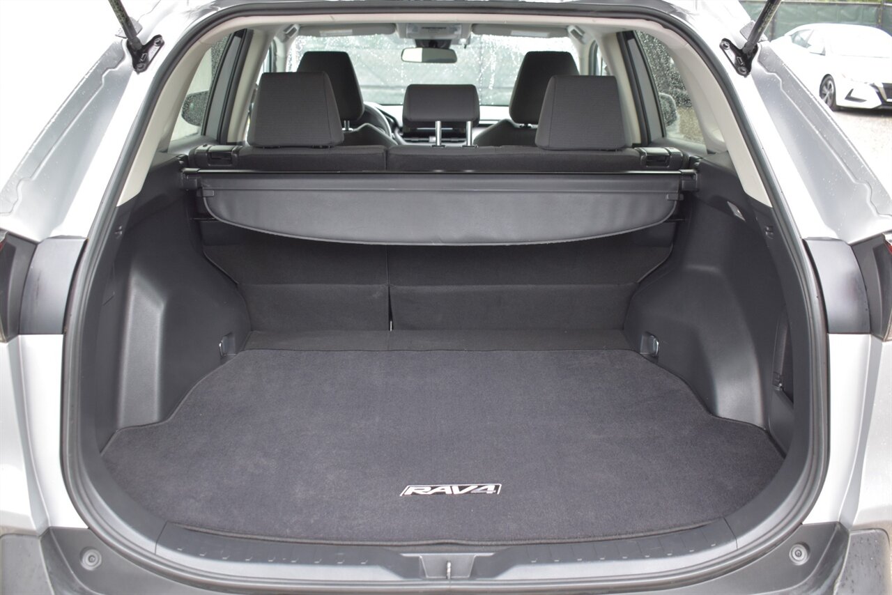 2019 Toyota RAV4 Hybrid LE AWD 4dr SUV! 41 City MPG! 38 Hwy MPG! Back Up Camera! Lane Assist! Blind Spot Monitor! Bluetooth Connectivity! Roof Rack! Heated Seats! Sport/ECO/EV/Trail Drive Modes! - Photo 31 - Portland, OR 97266