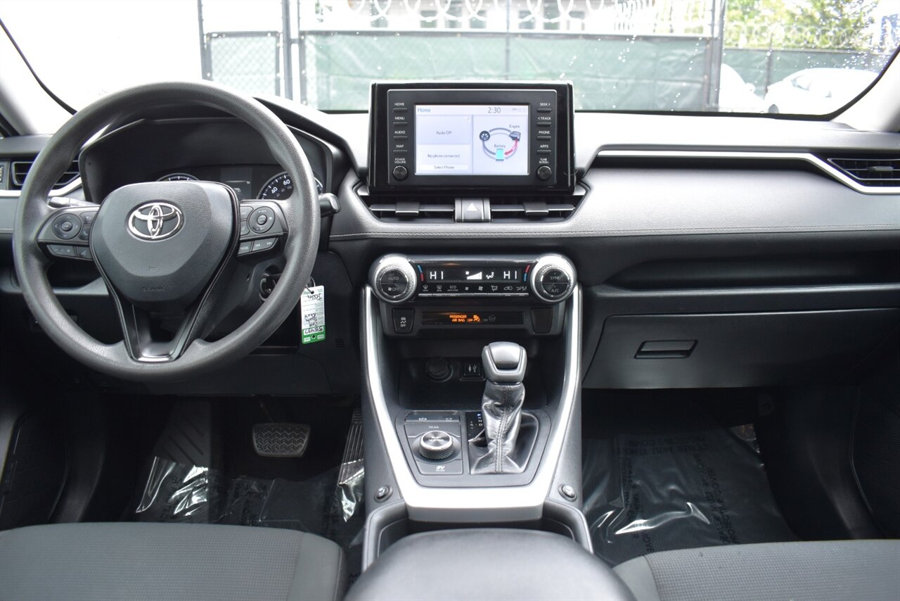 2019 Toyota RAV4 Hybrid LE AWD 4dr SUV! 41 City MPG! 38 Hwy MPG! Back Up Camera! Lane Assist! Blind Spot Monitor! Bluetooth Connectivity! Roof Rack! Heated Seats! Sport/ECO/EV/Trail Drive Modes! - Photo 12 - Portland, OR 97266