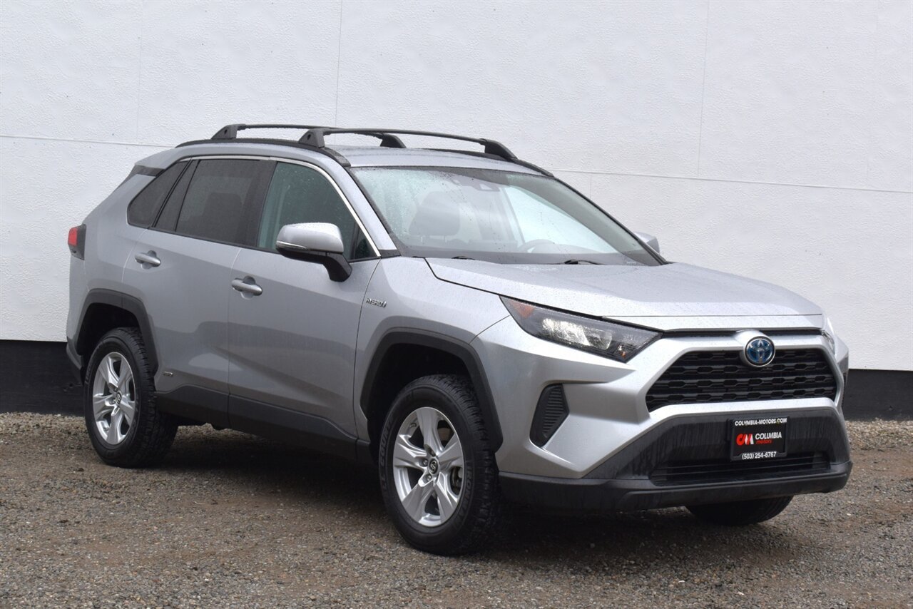 2019 Toyota RAV4 Hybrid LE  AWD 4dr SUV! 41 City MPG! 38 Hwy MPG! Back Up Camera! Lane Assist! Blind Spot Monitor! Bluetooth Connectivity! Roof Rack! Heated Seats! Sport/ECO/EV/Trail Drive Modes! - Photo 1 - Portland, OR 97266