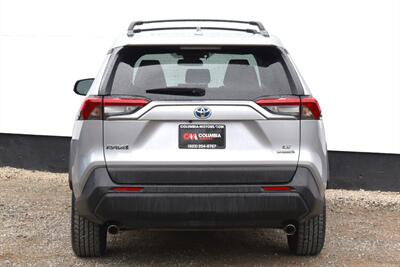 2019 Toyota RAV4 Hybrid LE AWD 4dr SUV! 41 City MPG! 38 Hwy MPG! Back Up Camera! Lane Assist! Blind Spot Monitor! Bluetooth Connectivity! Roof Rack! Heated Seats! Sport/ECO/EV/Trail Drive Modes! - Photo 4 - Portland, OR 97266