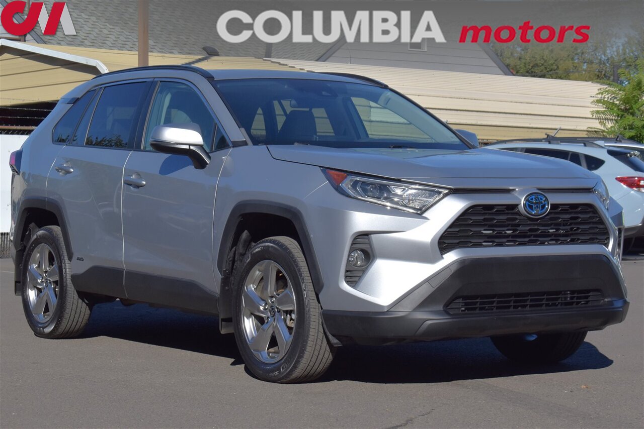 2021 Toyota RAV4 Hybrid XLE Premium  AWD 4dr SUV**BY APPOINTMENT ONLY**Back-Up Cam! Adaptive Cruise Control! Bluetooth! Heated Leather Seats! Trail/EV/Eco/Sport Mode! Sunroof! Power Liftgate! Trunk Cargo Cover! - Photo 1 - Portland, OR 97266