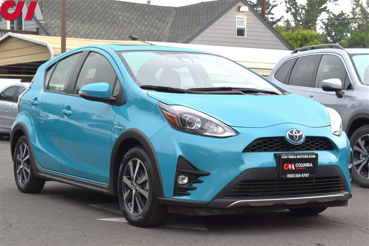 2018 Toyota Prius c Four 4dr Hatchback! 48 City MPG! 43 Hwy MPG! Back Up Cam! Navi! Lane Assist! Pre-Collision Sys! EV/ECO Modes! Heated Leather Seats! - Photo 1 - Portland, OR 97266