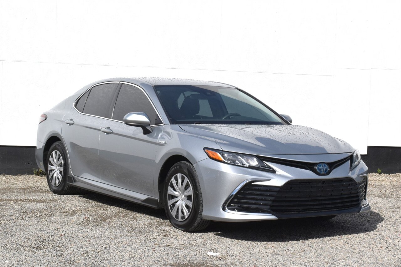 2021 Toyota Camry Hybrid LE Sedan  4dr! Excellent MPG! Adaptive Cruise Control! Lane Keep Assist! Apple CarPlay & Android Auto! Backup Camera! - Photo 1 - Portland, OR 97266