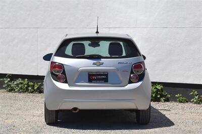 2012 Chevrolet Sonic LT 4dr Hatchback! 27 City MPG! 37 Hwy MPG! CD/Aux-In! Bluetooth Connectivity! Air Conditioning! Compact & Easy to Park! Front-Wheel Drive! Stability Control! Traction Control! Rear Child Safety Locks! - Photo 4 - Portland, OR 97266