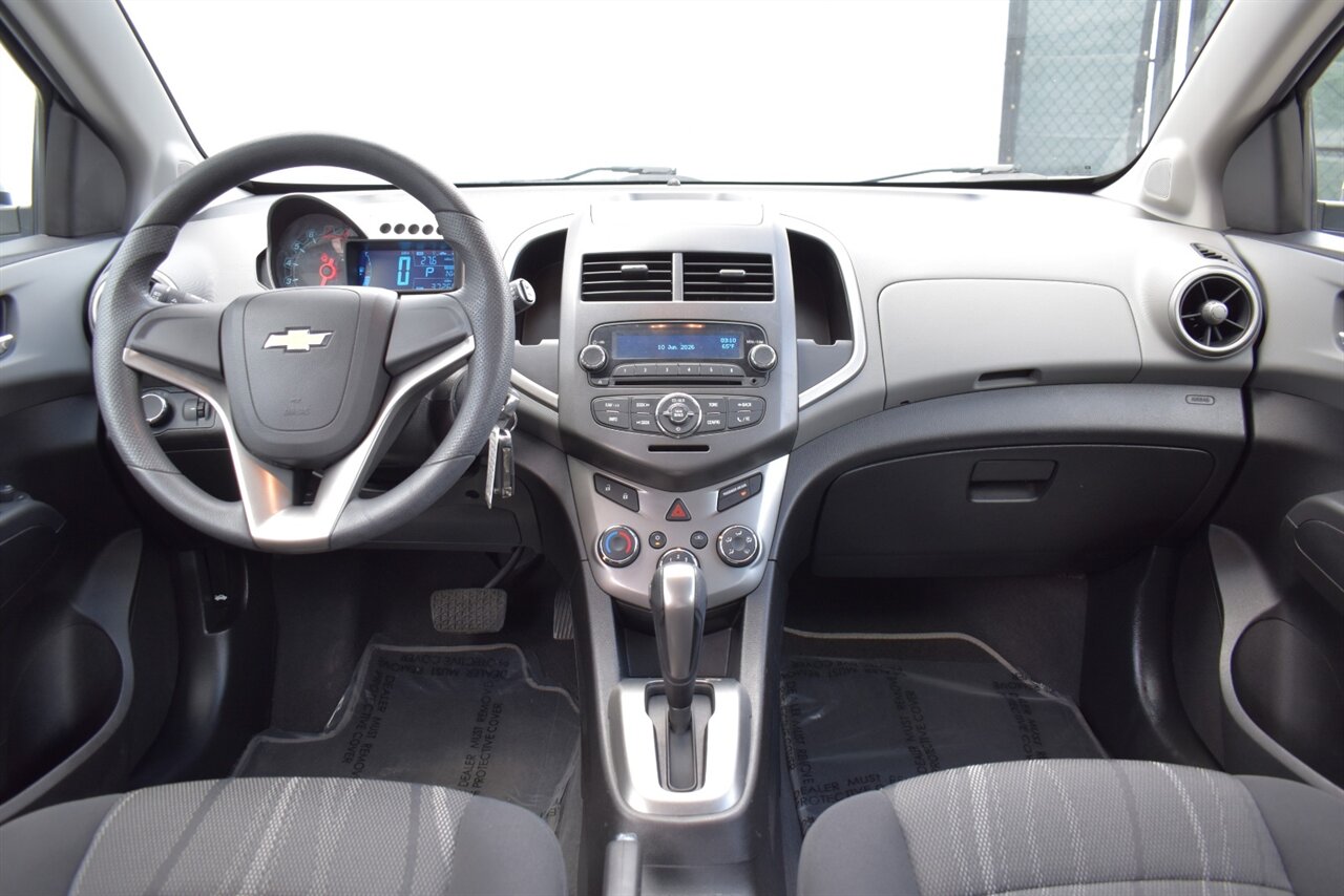 2012 Chevrolet Sonic LT 4dr Hatchback! 27 City MPG! 37 Hwy MPG! CD/Aux-In! Bluetooth Connectivity! Air Conditioning! Compact & Easy to Park! Front-Wheel Drive! Stability Control! Traction Control! Rear Child Safety Locks! - Photo 13 - Portland, OR 97266