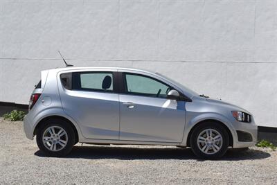 2012 Chevrolet Sonic LT 4dr Hatchback! 27 City MPG! 37 Hwy MPG! CD/Aux-In! Bluetooth Connectivity! Air Conditioning! Compact & Easy to Park! Front-Wheel Drive! Stability Control! Traction Control! Rear Child Safety Locks! - Photo 6 - Portland, OR 97266