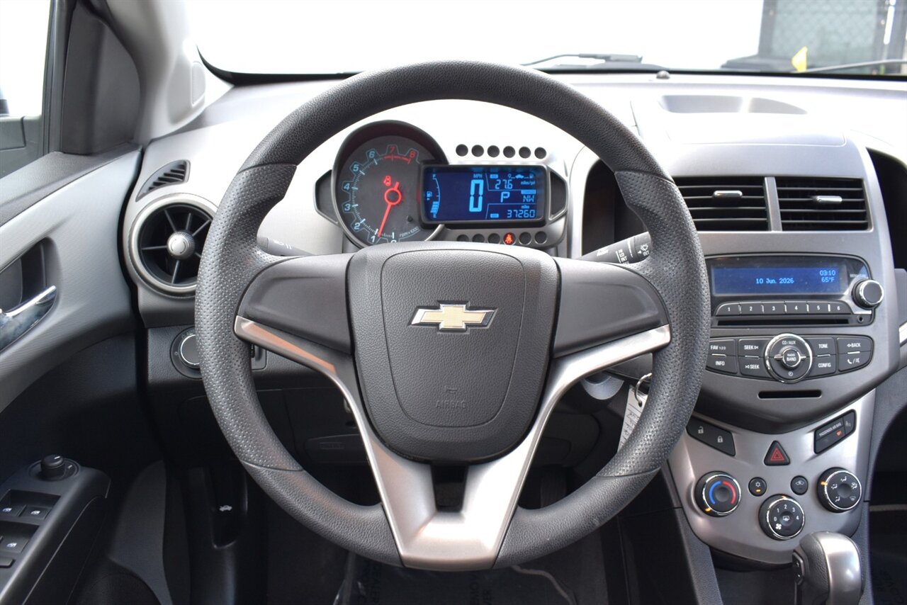 2012 Chevrolet Sonic LT 4dr Hatchback! 27 City MPG! 37 Hwy MPG! CD/Aux-In! Bluetooth Connectivity! Air Conditioning! Compact & Easy to Park! Front-Wheel Drive! Stability Control! Traction Control! Rear Child Safety Locks! - Photo 14 - Portland, OR 97266
