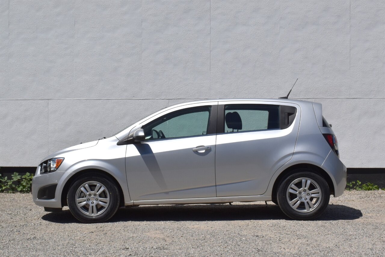 2012 Chevrolet Sonic LT 4dr Hatchback! 27 City MPG! 37 Hwy MPG! CD/Aux-In! Bluetooth Connectivity! Air Conditioning! Compact & Easy to Park! Front-Wheel Drive! Stability Control! Traction Control! Rear Child Safety Locks! - Photo 9 - Portland, OR 97266