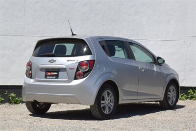 2012 Chevrolet Sonic LT 4dr Hatchback! 27 City MPG! 37 Hwy MPG! CD/Aux-In! Bluetooth Connectivity! Air Conditioning! Compact & Easy to Park! Front-Wheel Drive! Stability Control! Traction Control! Rear Child Safety Locks! - Photo 5 - Portland, OR 97266