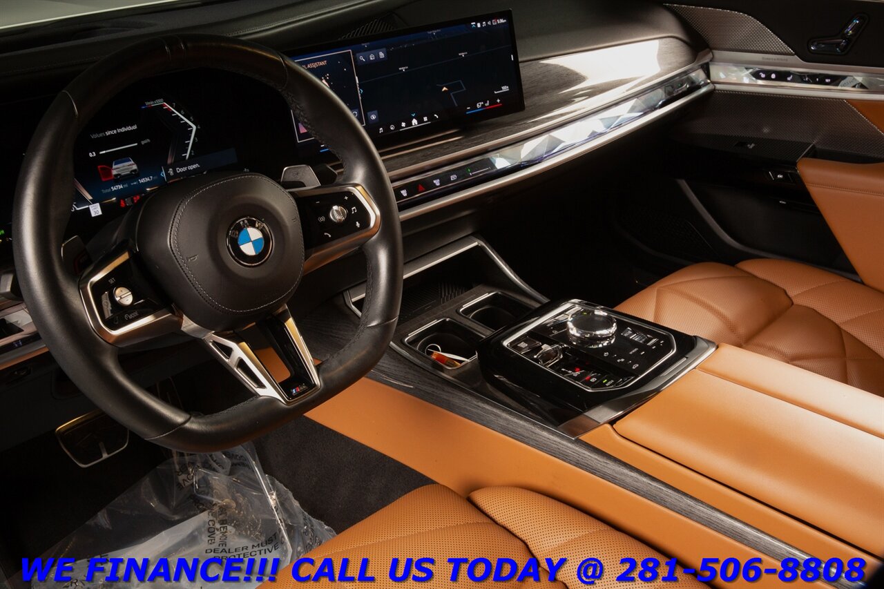 2023 BMW 2023 740i M-Sport HUD WILKINS SKY LOUNGE PANO BLIS   - Photo 11 - Houston, TX 77031